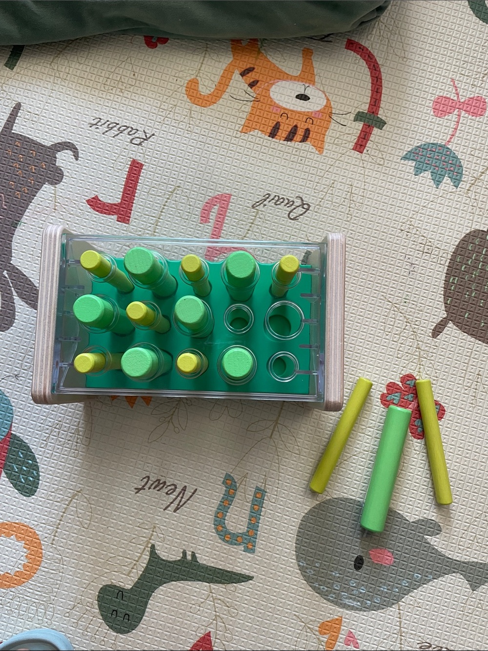 Green and Yellow Peg Stacking Learning Toy - Brand Unknown